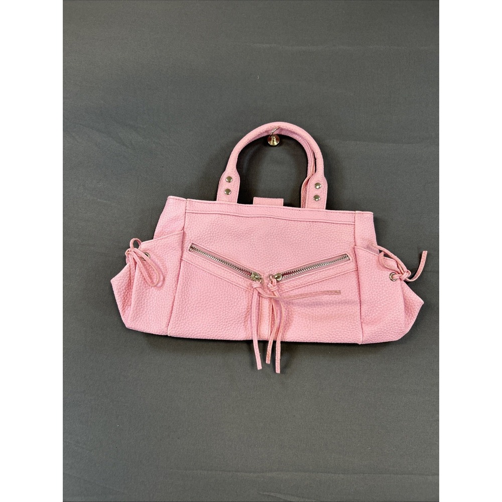 pink Texturedine handbag features a textured pebbled leather exterior 13 X 7